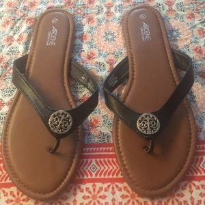 NWOT Black Sandals with Silver Medallion. Size 9.